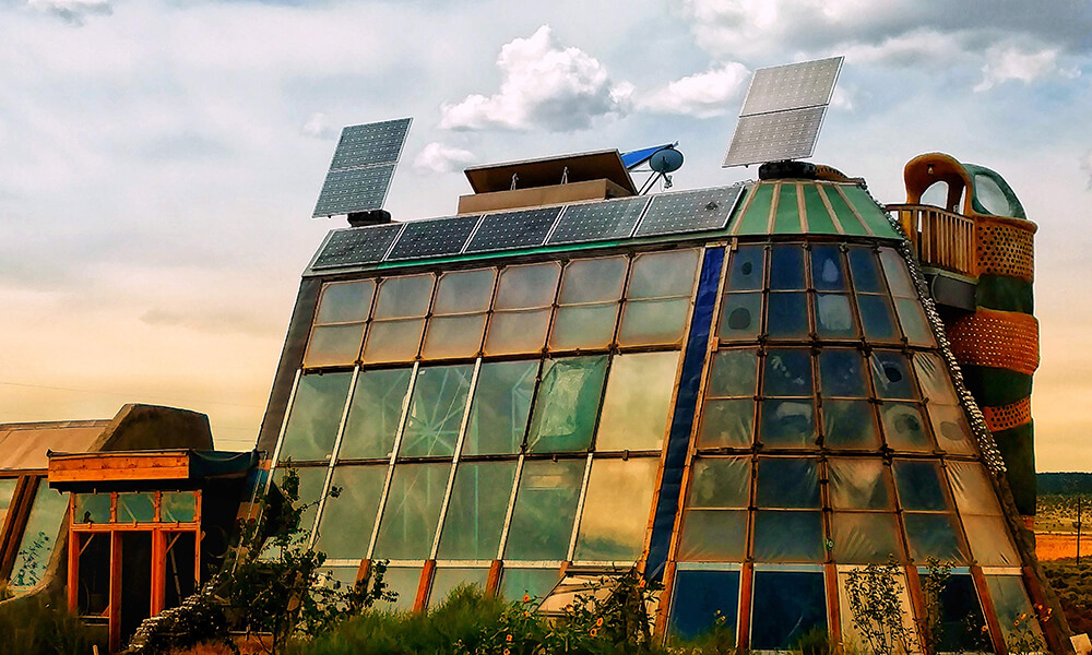 a glass filled earthship