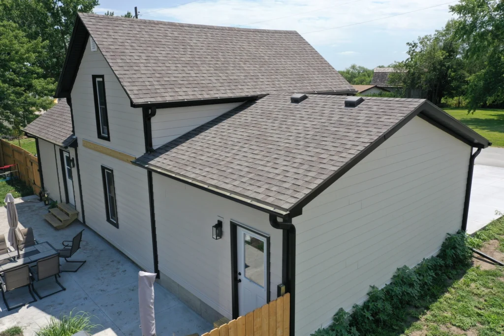 close side view of shingle roofing services after roof storm damage in bellevue ne