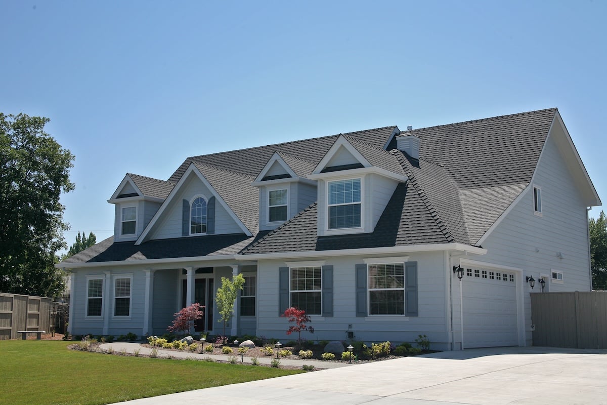 Nicely Landscaped New Two-story American Home with new roof shingles