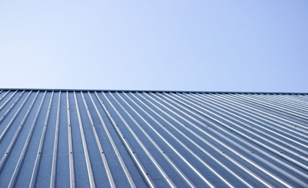 metal decking for the roof of the house against the sky