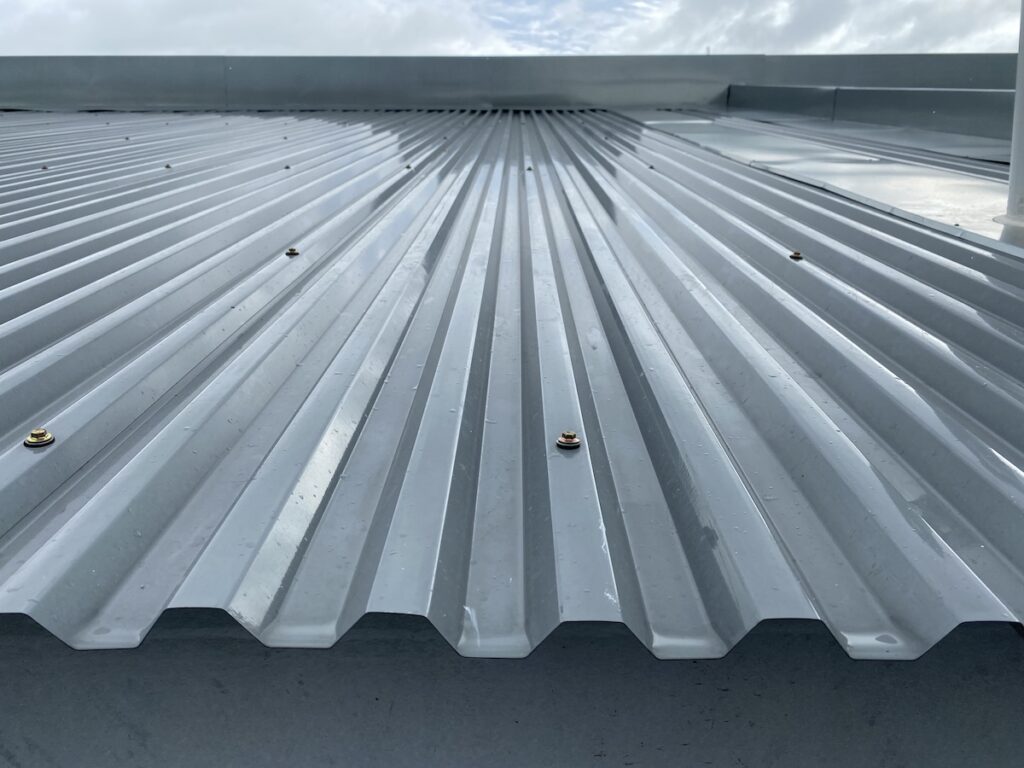 Close up of a corrugated metal deck roof system 