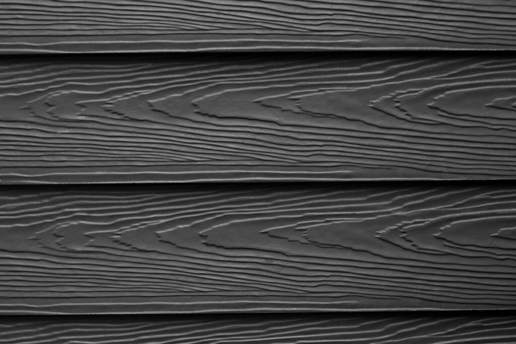 black metal siding with wood texture