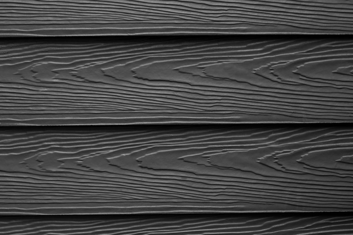 black metal siding with wood texture