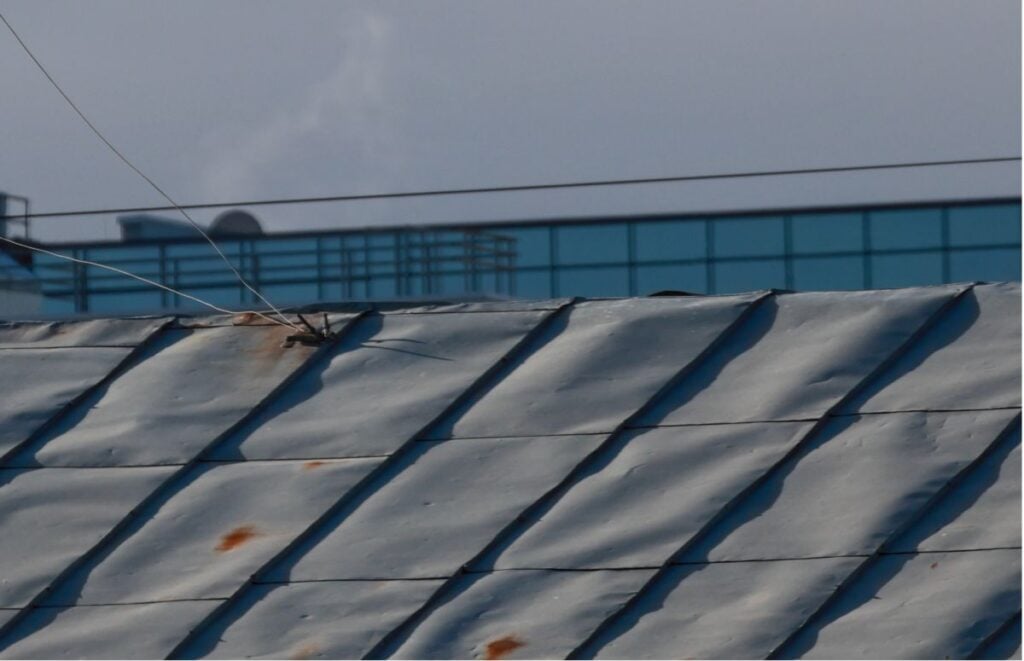 oil canning on a standing seam metal roof