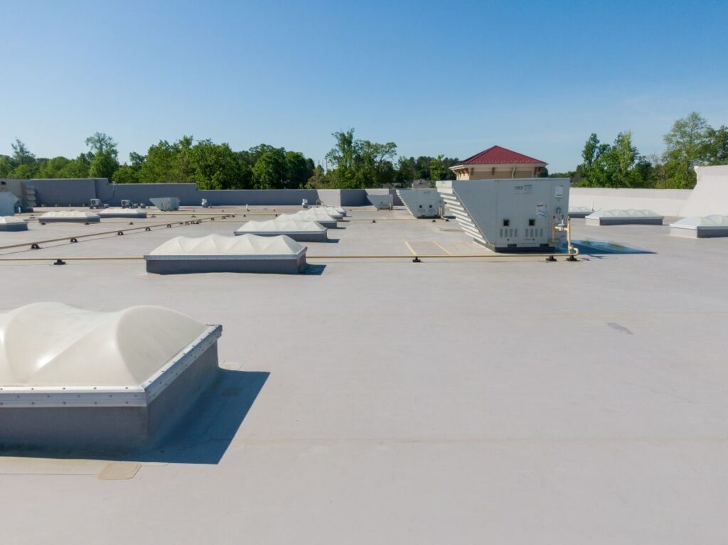Drone Images of TPO Flat Commercial Roof With Metal Panels