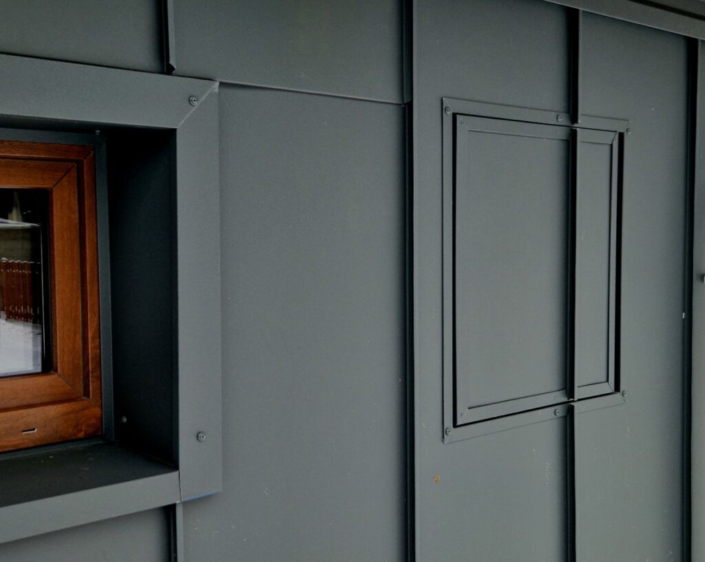 how to install metal siding dark green small window