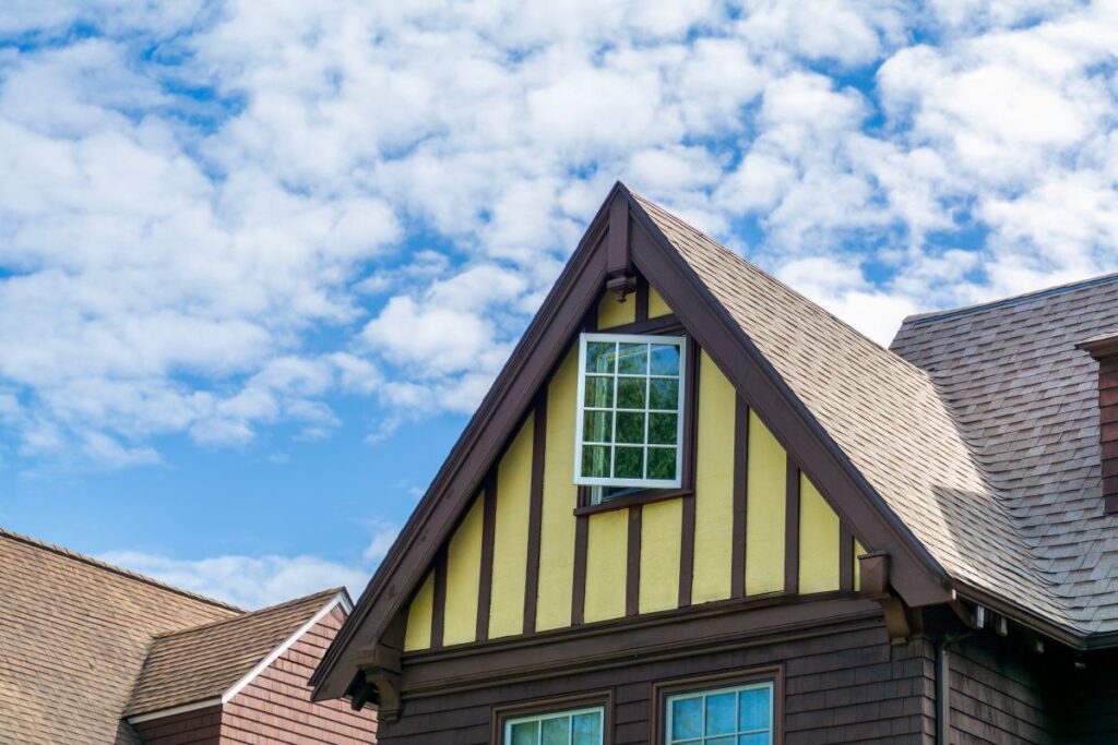 metal roof trim gable roof with light grey shingles