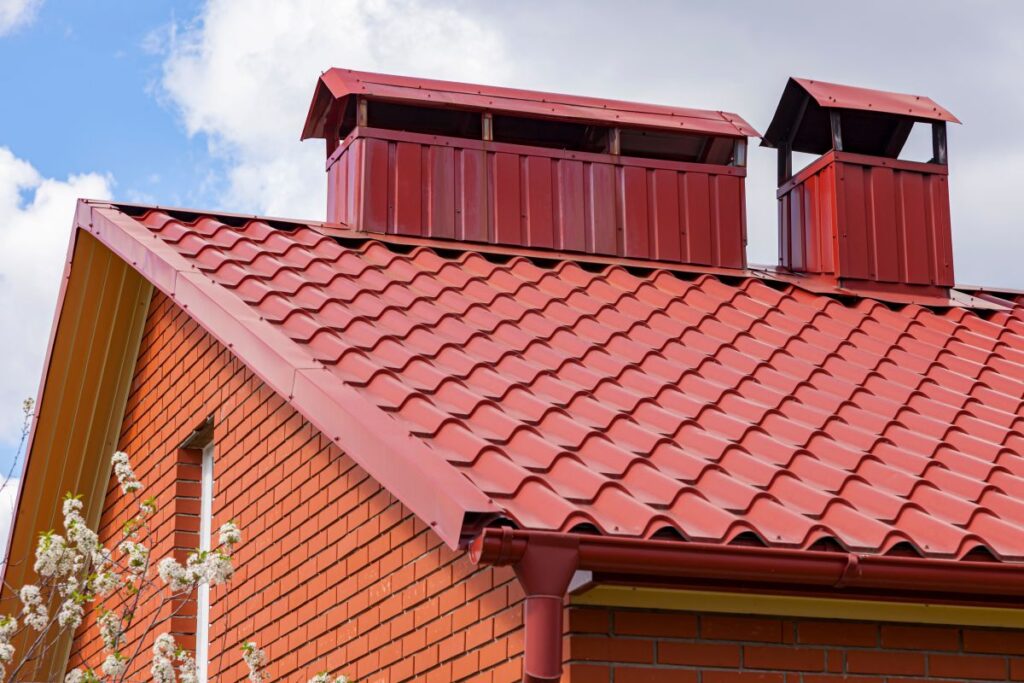 metal roof trim red metallic tiles two chimneys