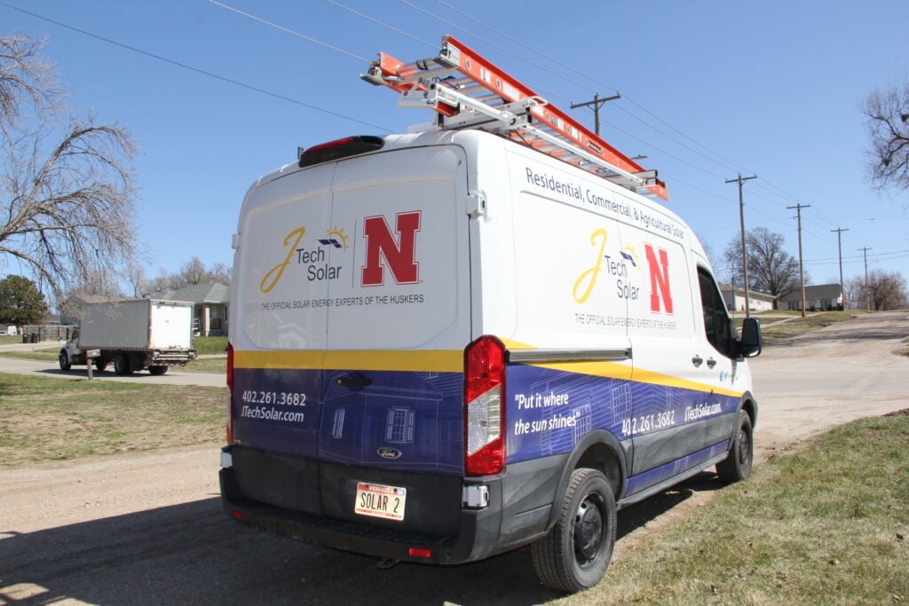 roof replacement financing branded van parked outside on the street